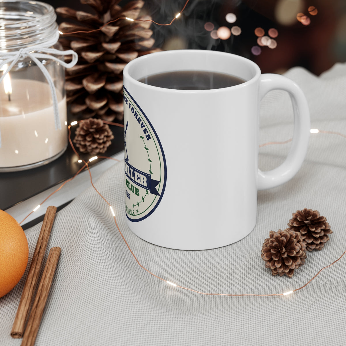 Personalized golf club coffee mug with vintage crest on a table